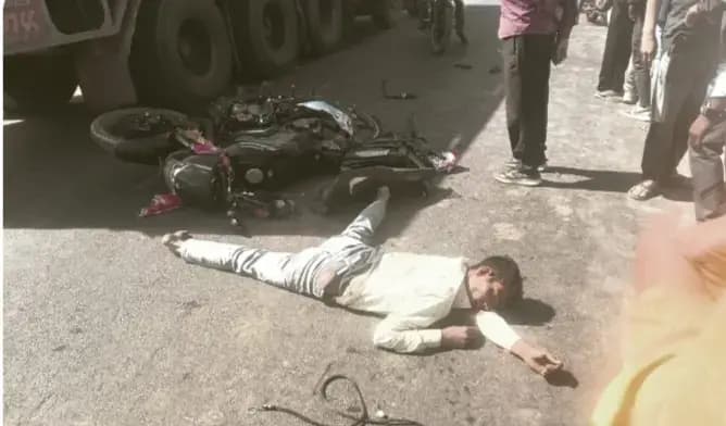 Breaking news: ट्रक ने बाइक सवार युवक को रौंदा युवक की मौत, महिला घायल